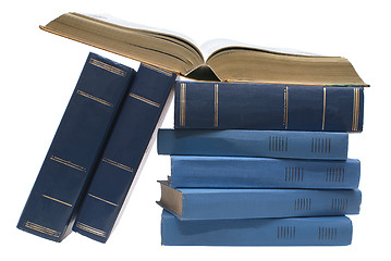 Image showing Open book and books.