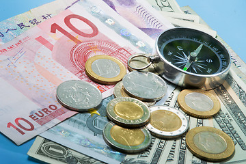 Image showing Compass over currency