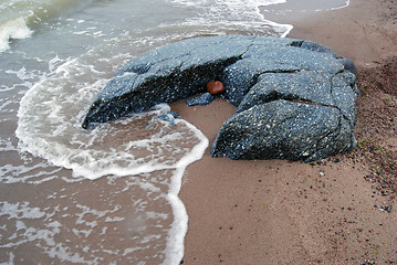 Image showing Waves beating stone on the cost 