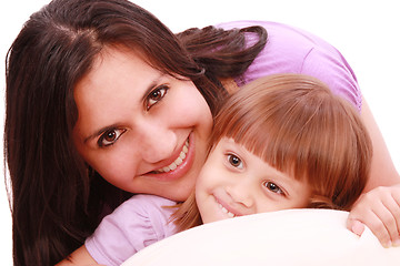 Image showing Mother and daughter posing happily in bed