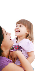 Image showing Mother and daughter smiling isolated over a white background. Fo