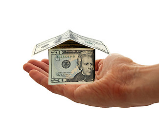 Image showing hand holding cash house