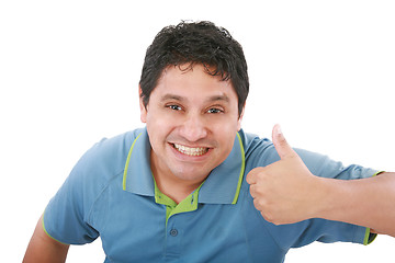 Image showing smiling young man with thumbs up on an isolated white background