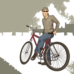 Image showing young man on a bicycle