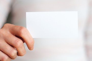 Image showing hand and blank paper with copyspace