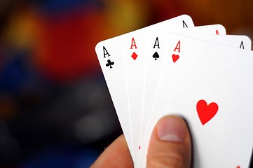 Image showing hand holding four aces