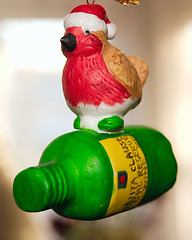 Image showing robin on a bottle