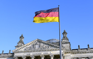 Image showing The German flag flying in front of the Reichstag in Berlin