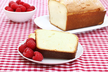 Image showing Fresh raspberries and pound cake.