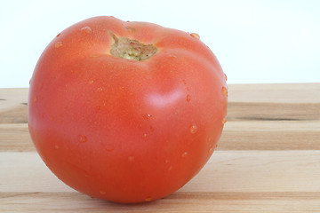 Image showing cutting a tomato