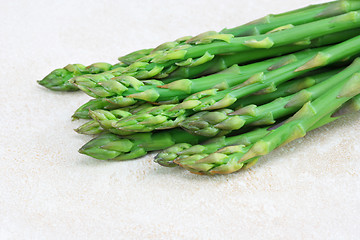 Image showing Asparagus on counter, close up with copy space.