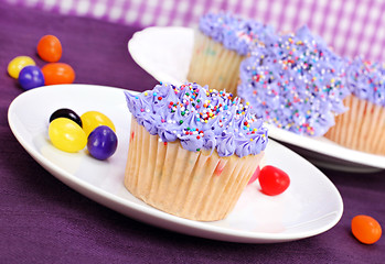 Image showing Purple Easter Cupcakes and Jelly Beans