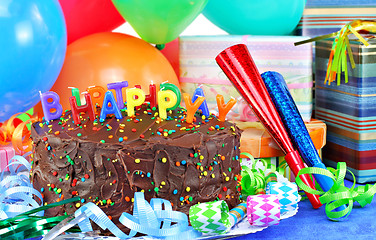 Image showing Happy Birthday Cake,balloons, gifts.