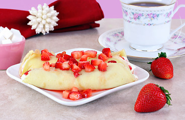 Image showing Strawberry Crepes in a feminine table setting.