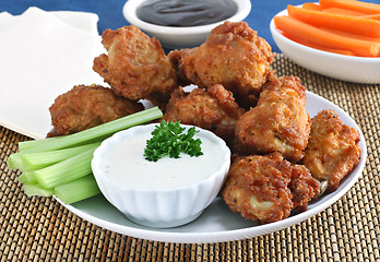 Image showing Fresh Chicken Wings with Vegetables and Sauce