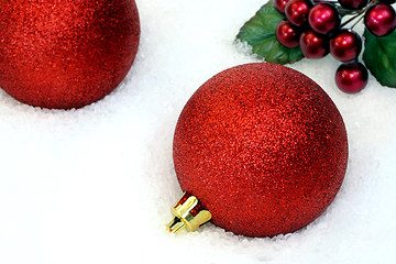 Image showing Christmas Ornaments in Snow