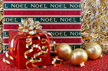 Image showing Christmas gifts with ornaments.