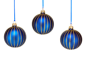 Image showing Three Blue and Gold Christmas Ornaments on White