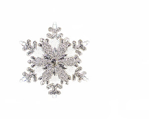 Image showing One silver snowflake isolated on white with copy space
