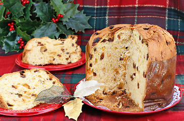 Image showing Italian Panetone Cake, whole and sliced.