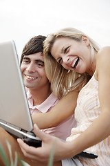 Image showing happy couple with laptop