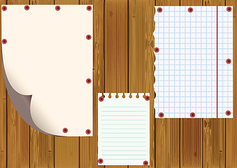 Image showing Standard sheets against wooden boards.