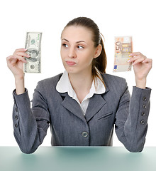 Image showing business woman holding a currency