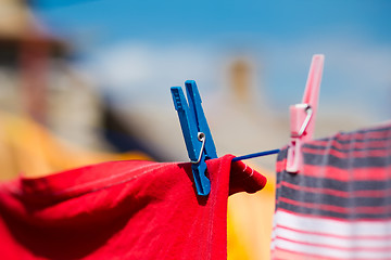 Image showing Washed clothes drying outside