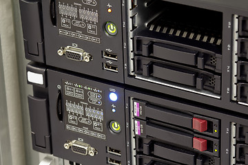 Image showing servers stack with hard drives in a datacenter