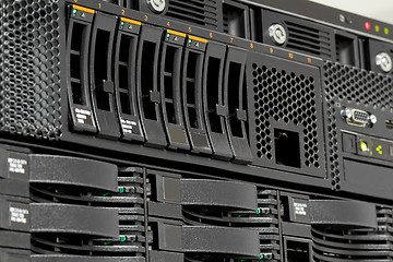 Image showing servers stack with hard drives in a datacenter