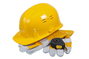 Image showing Tools and helmet of the builder, it is isolated on white