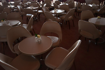 Image showing leather chairs and wooden tables