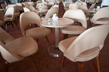 Image showing leather chairs and wooden tables