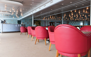 Image showing leather chairs and wooden tables