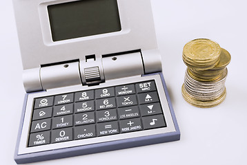 Image showing Calculator and Coins