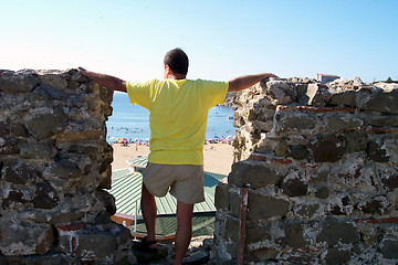 Image showing man watching sea