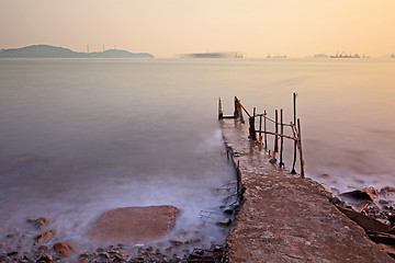 Image showing Jetty on sea at sunset