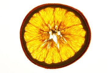 Image showing dried orange slices isolated on white background 