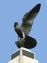 Image showing Proud eagle statue against blue sky