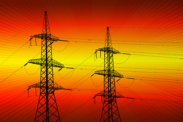 Image showing electric power transmission towers at sunset 