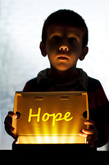 Image showing Child and box shine light