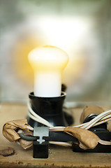 Image showing Old electrical components, cables and lamp