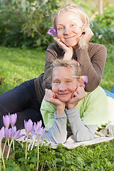 Image showing Mum and the daughter in the fall in a garden