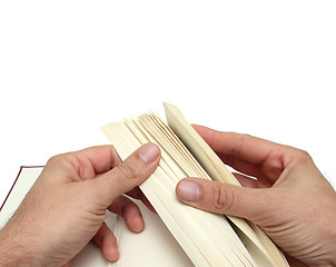 Image showing hands and book