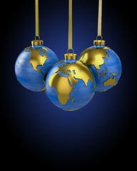 Image showing Three christmas balls shaped as globe or planet