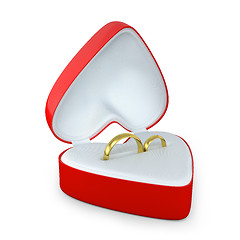 Image showing Pair of wedding rings in a heart shaped box