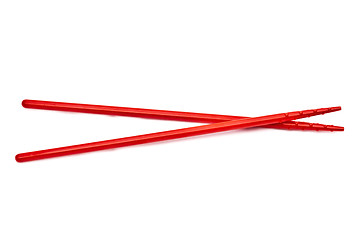 Image showing Red chopsticks isolated on white background 