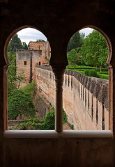 Image showing Medieval bastions seen through the castle window in Alhambra 