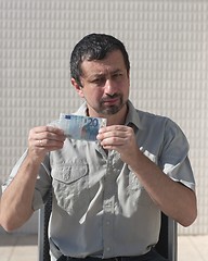 Image showing Euro money in hand of business man