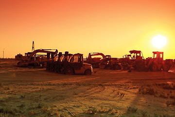 Image showing Trucks at sunset.